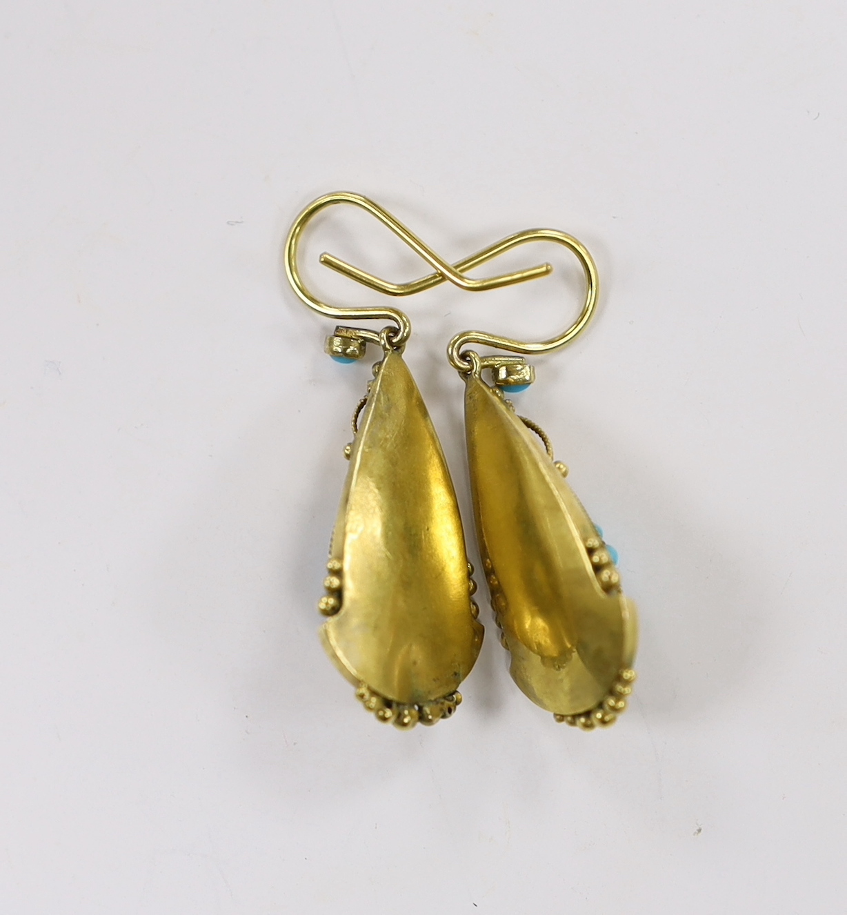 A pair of Victorian yellow metal and turquoise cluster set pear shaped drop earrings, 26mm, gross weight 4.1 grams.